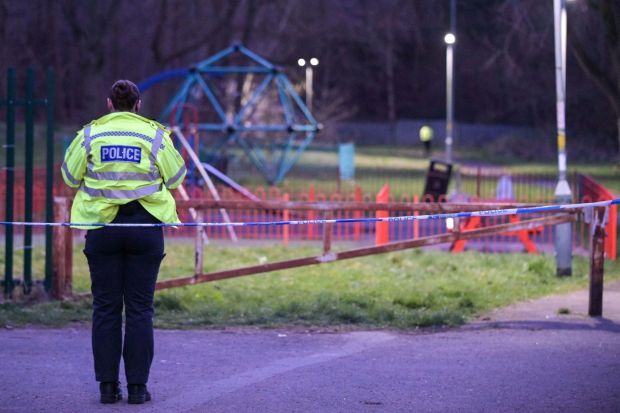 An image collage containing 1 images, Image 1 shows Police officer at a crime scene near a playground