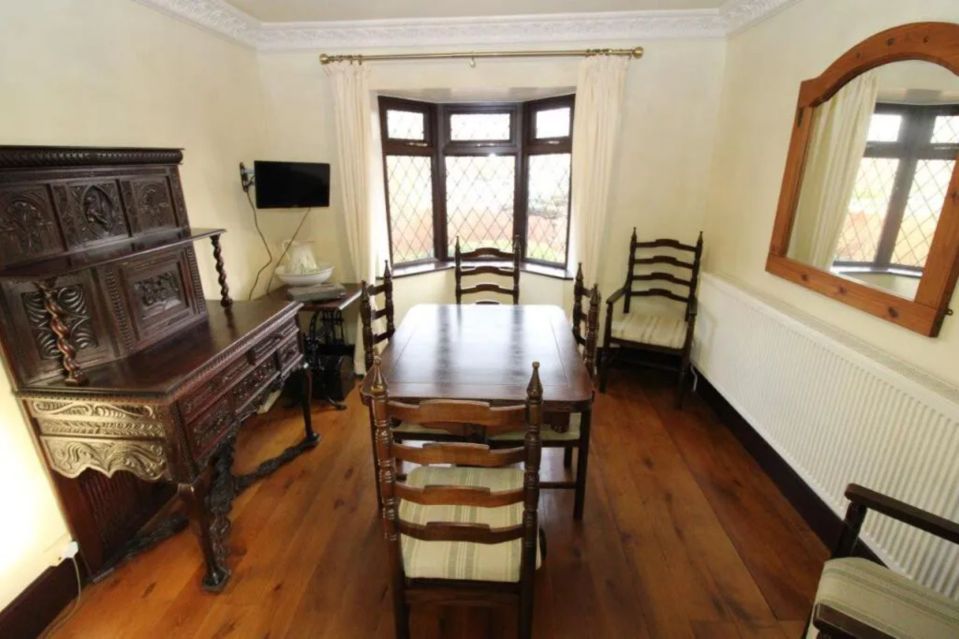 An image collage containing 1 images, Image 1 shows Dining room with antique furniture and bay window