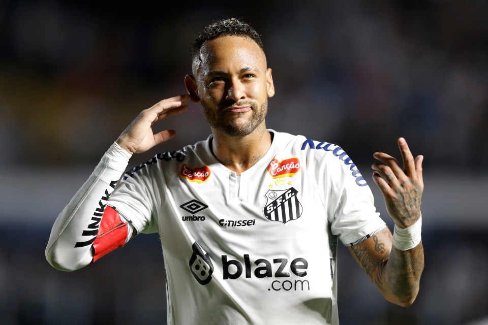 Neymar of Santos celebrating after scoring a goal.