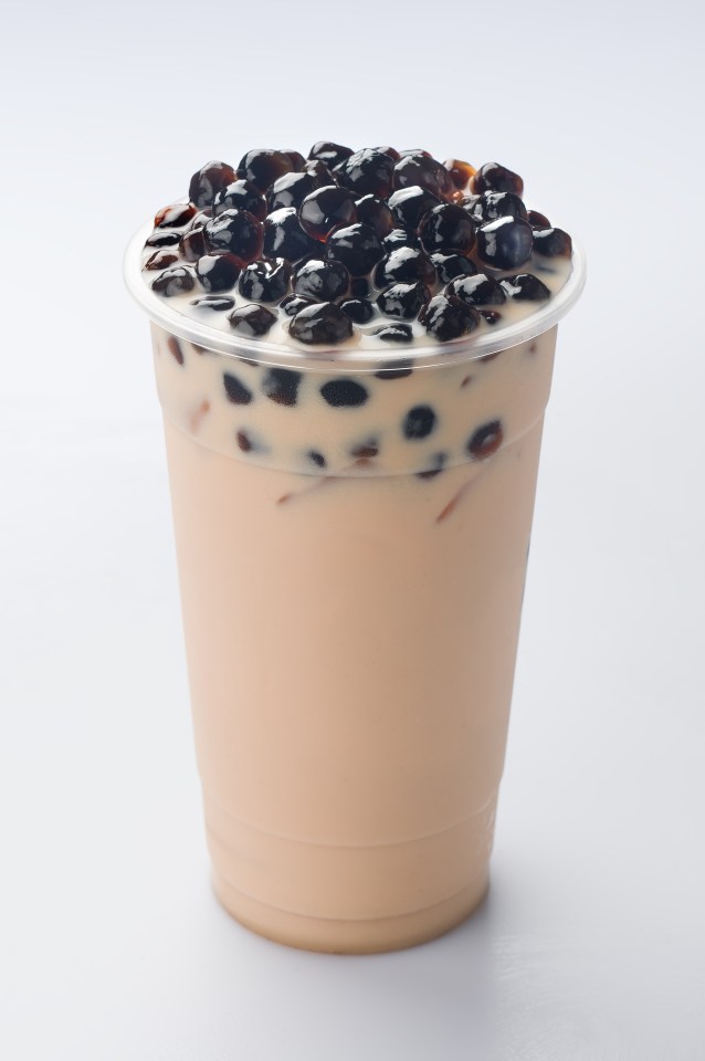 Pearl milk tea in a plastic cup.