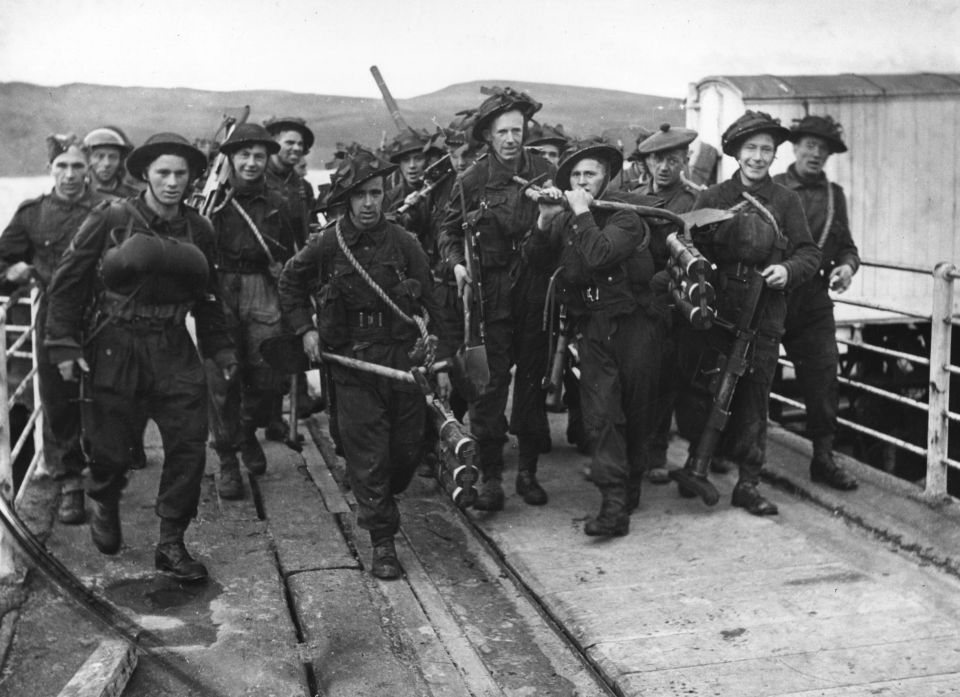 British soldiers returning to base after maneuvers in World War II.