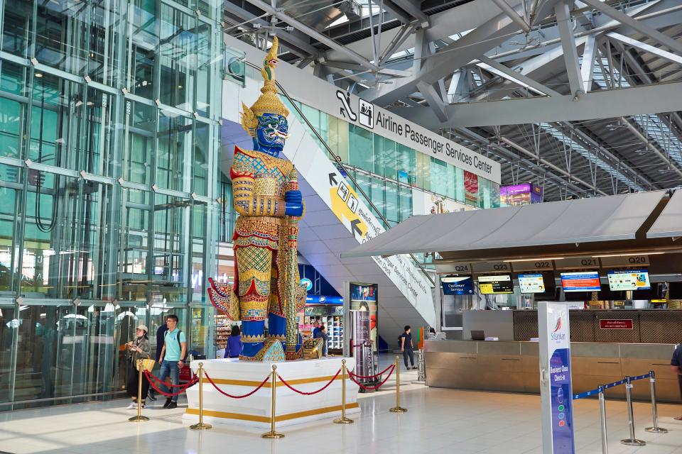 Large Yaksha statue in Suvarnabhumi Airport lobby.