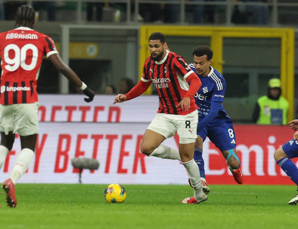 Ruben Loftus-Cheek and Dele Alli competing for the ball during a soccer match.