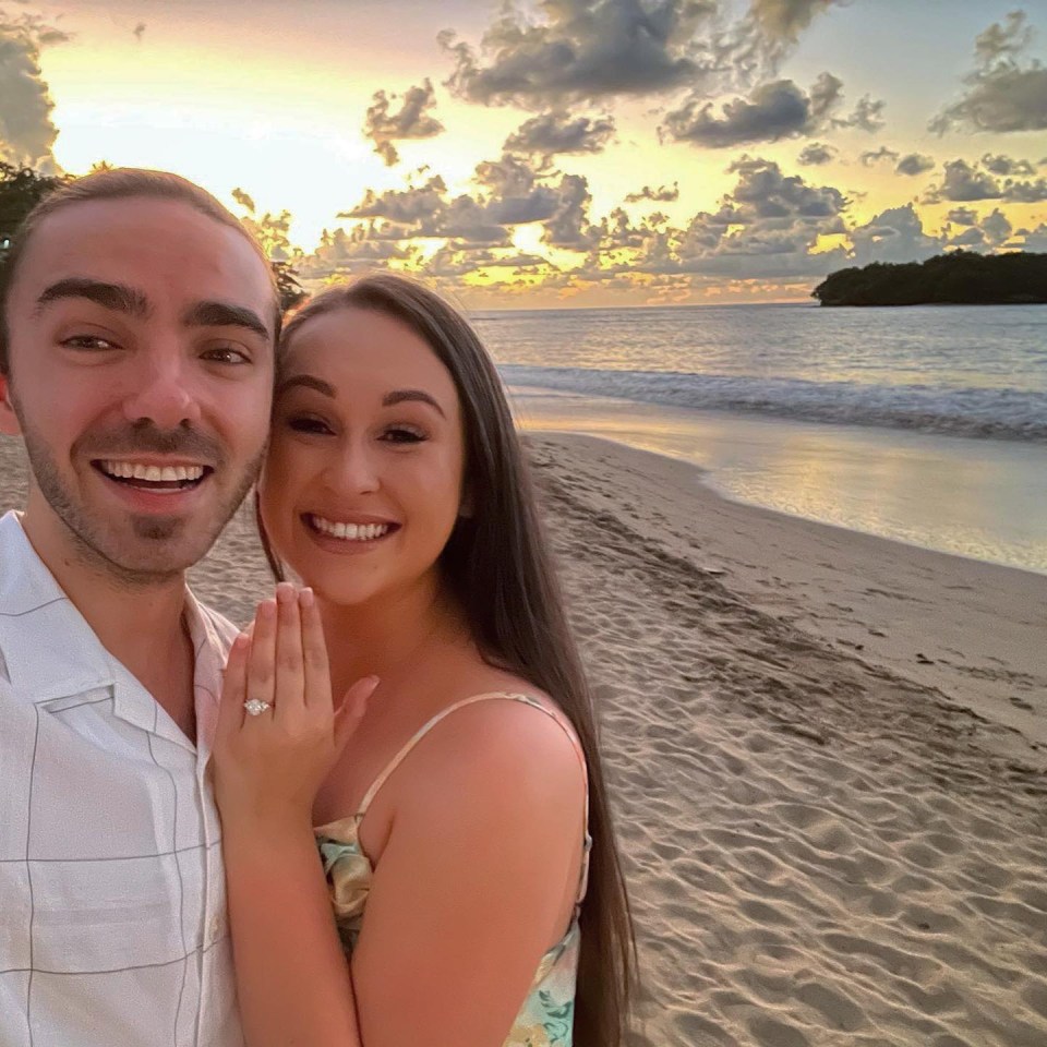 Nathan Sykes and Charlotte Burke engaged on a beach at sunset.