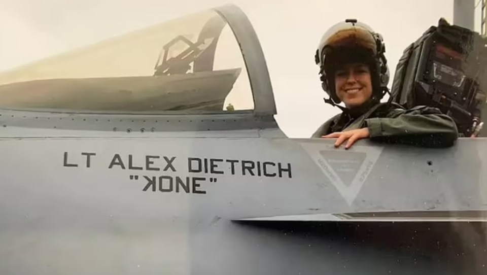 Navy pilot Lt. Alex Dietrich in a fighter jet cockpit.